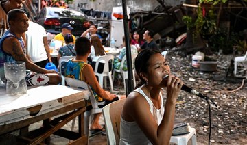 鈥榃e love singing鈥�: Filipinos find joy in karaoke
