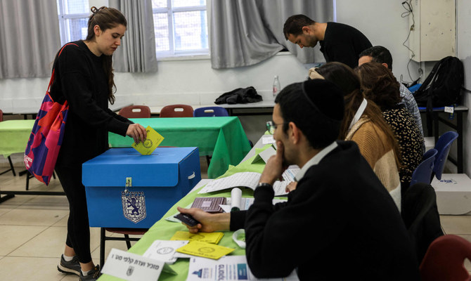 Israelis vote for municipal councils in test of public mood